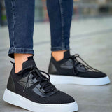Knit black sneakers, low-top lace-up with white sole and textured side straps