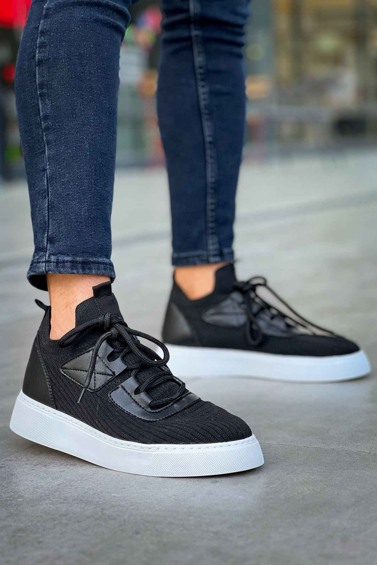 Knit black sneakers, low-top lace-up with white sole and textured side straps