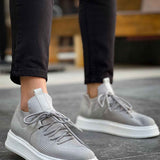 Light gray knit low-top sneakers, lace-up with white rubber sole