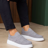 Gray knit sneakers with white sole and sock-like collar, side-by-side view
