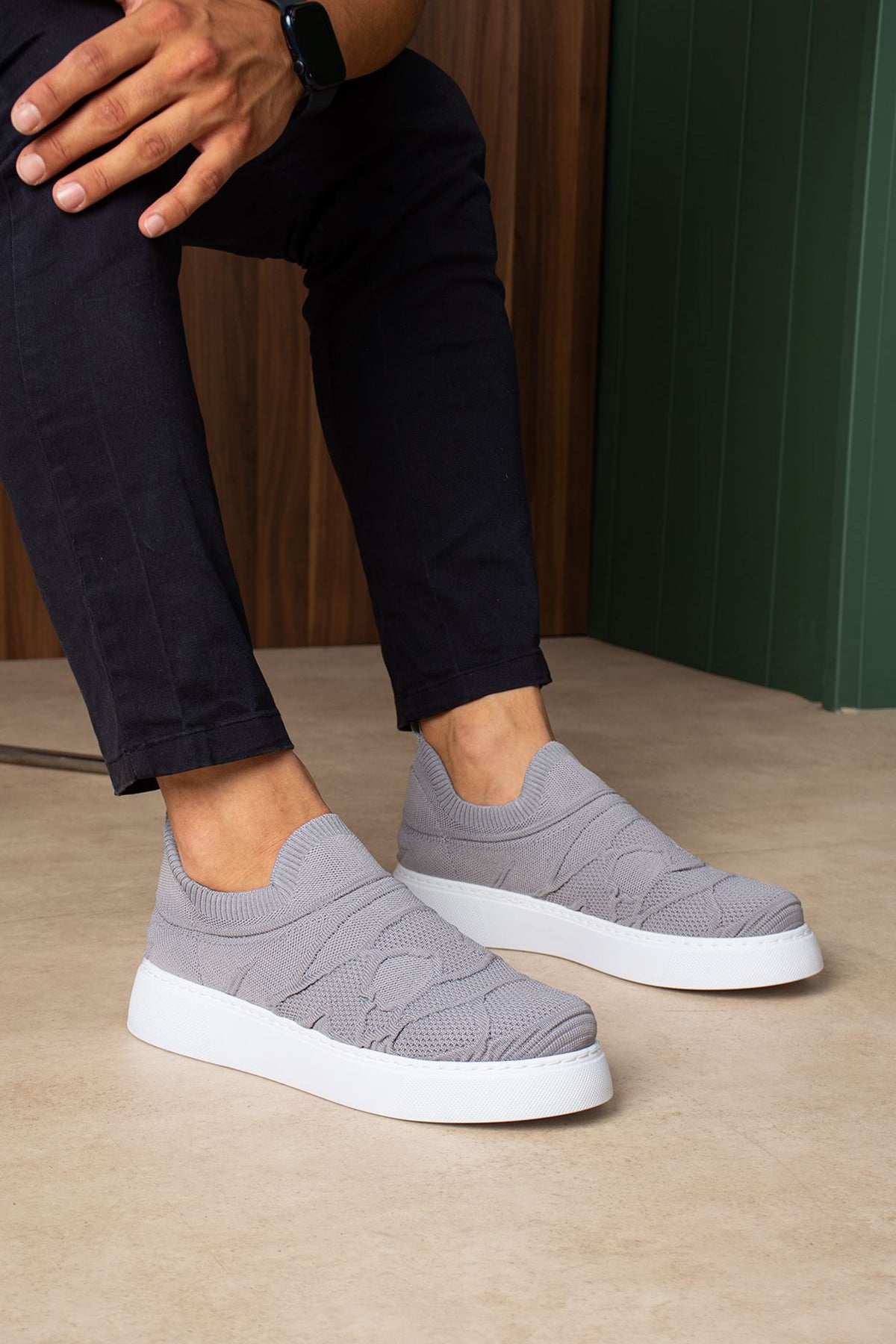 Gray knit sneakers with white sole and sock-like collar, side-by-side view
