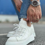 Men's knit white sneakers with lace-up front, textured upper, side view