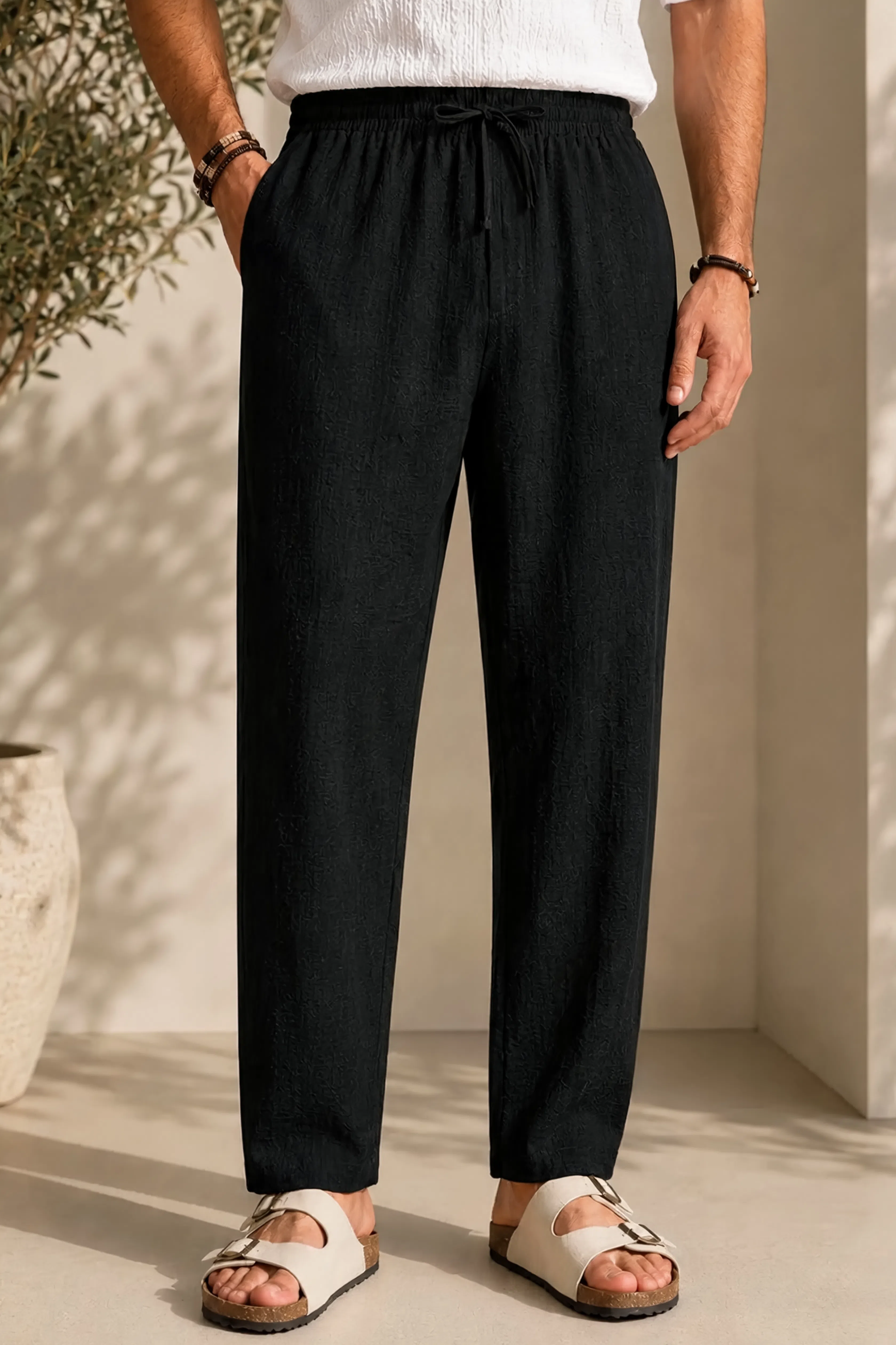 Men's linen pants in dark black, elastic drawstring waist, relaxed ankle-length fit