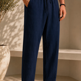 Men's linen pants in navy blue, drawstring elastic waist, ankle-length, side pockets