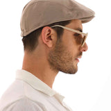 Men's mink flat cap Ritag in taupe, side profile with curved brim
