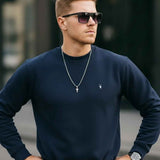 Men's navy crewneck sweatshirt with ribbed neckline and cuffs