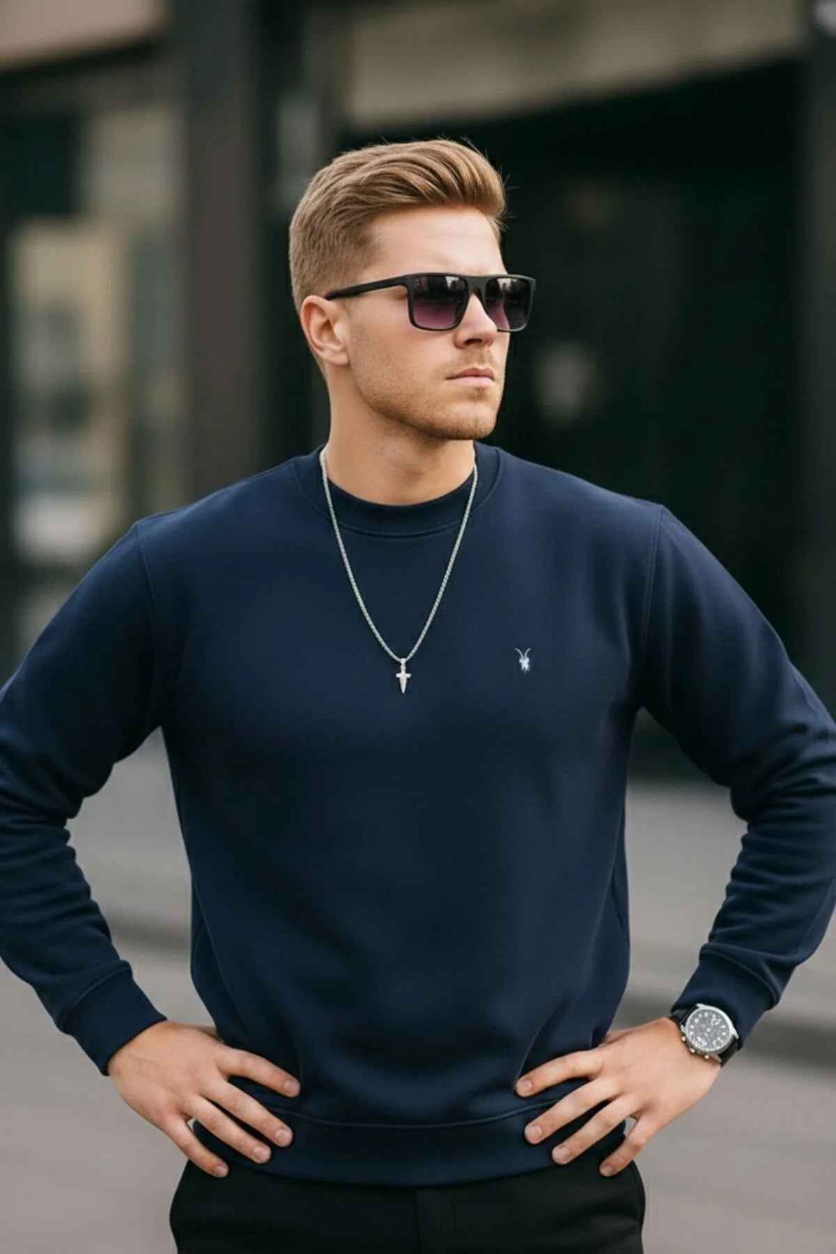 Men's navy crewneck sweatshirt with ribbed neckline and cuffs