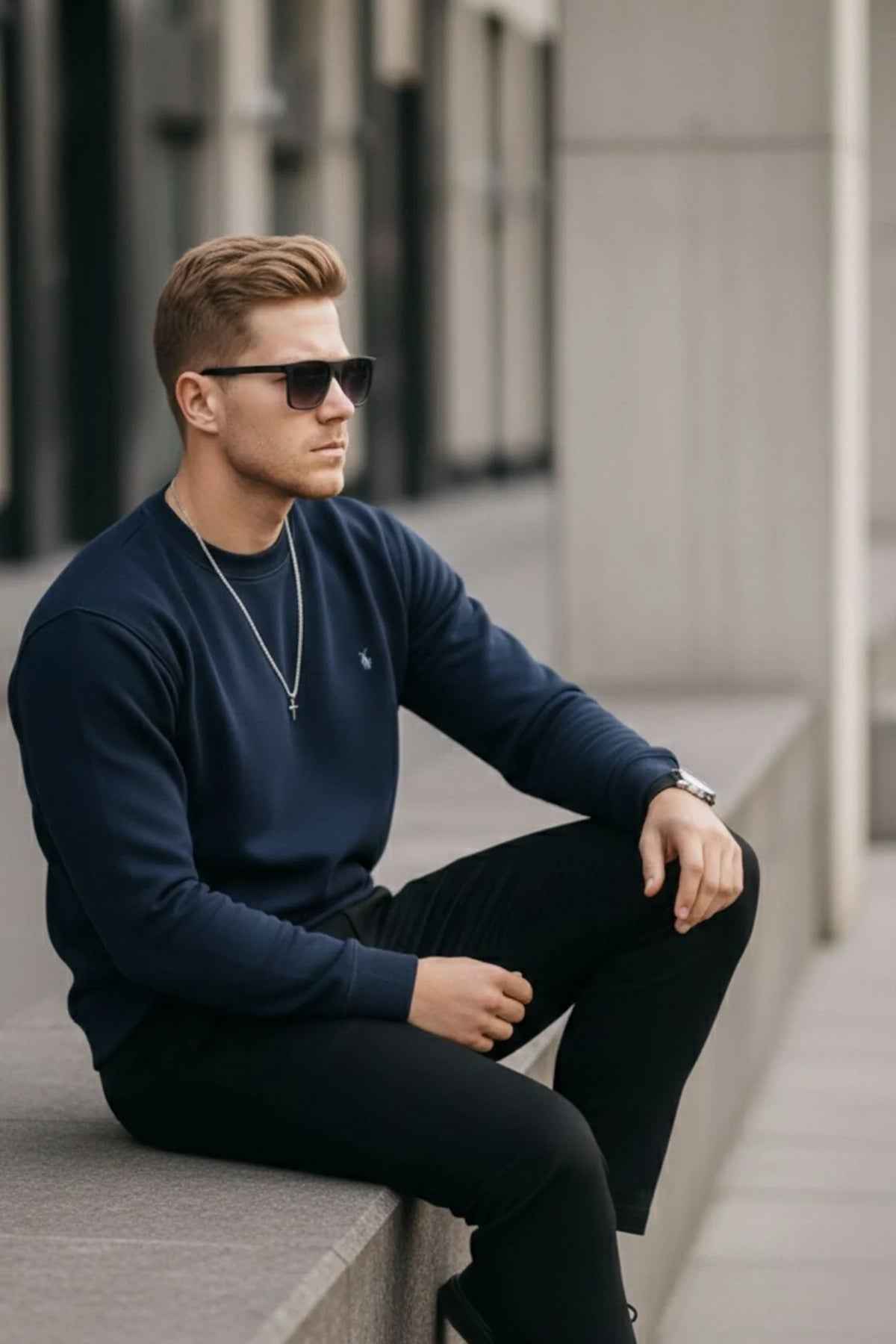 Men's navy crewneck sweatshirt, ribbed hem and cuffs, small chest logo