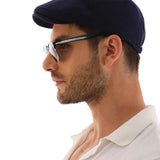 Men's navy blue flat cap, curved brim and soft crown