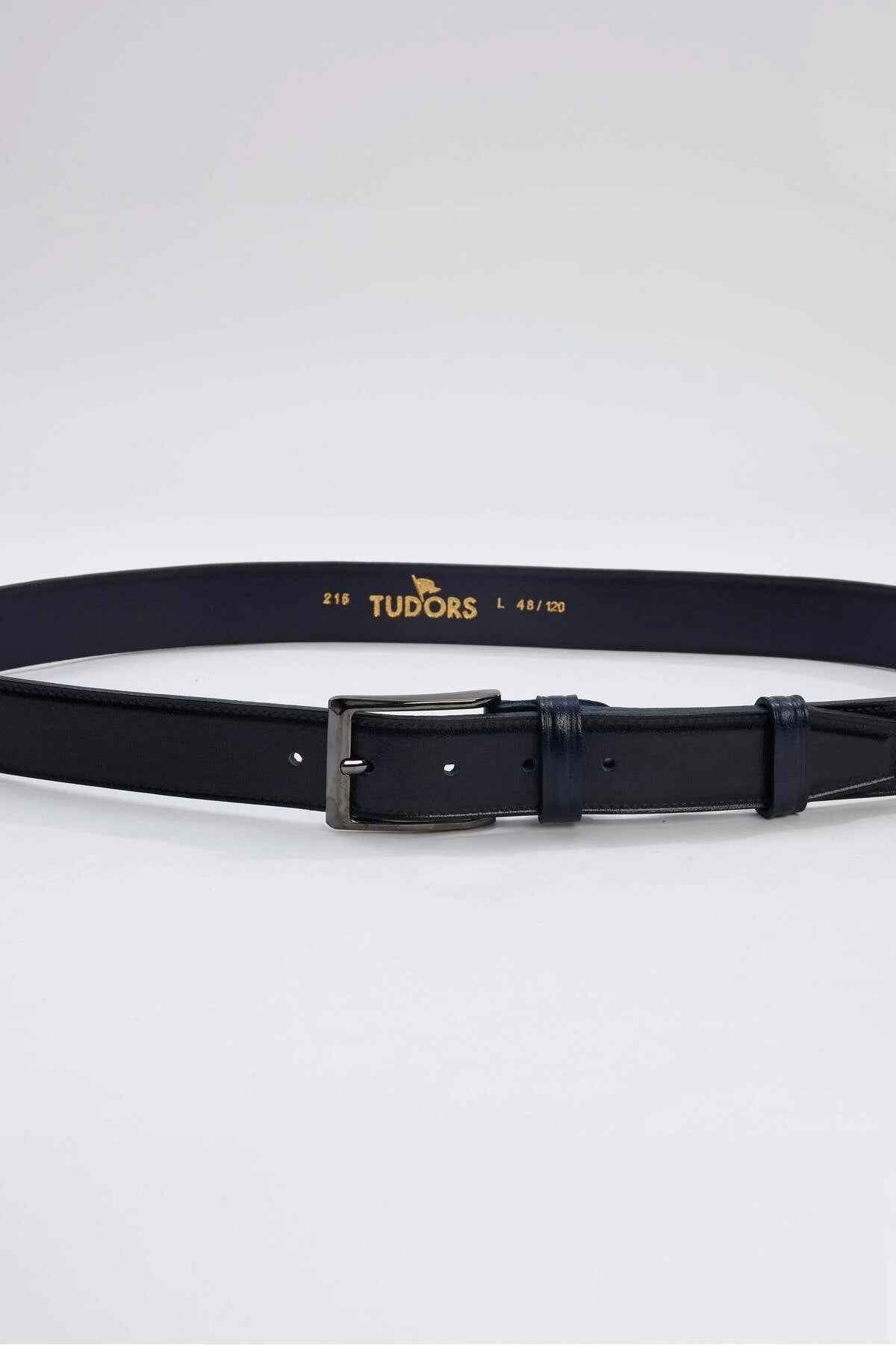 Men's leather belt with navy strap, TUDORS text, and silver rectangular buckle
