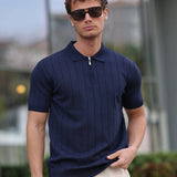 Men's navy knit half-zip polo shirt with vertical stripes and short sleeves