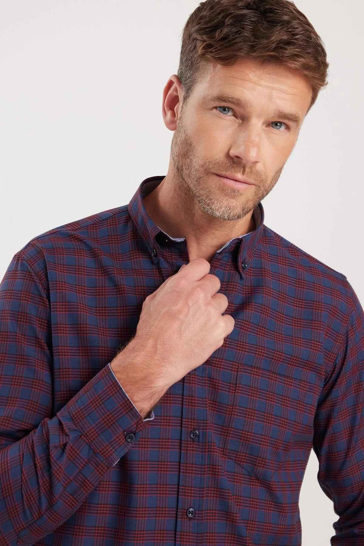 Men's plaid button-up shirt collar in dark navy with rust-orange check pattern
