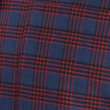 Plaid fabric swatch in dark navy with rust-orange grid lines