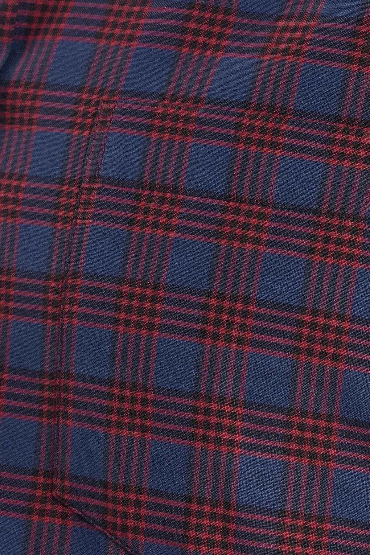 Plaid fabric swatch in dark navy with rust-orange grid lines