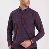 Men's plaid button-up shirt in dark navy with rust-orange checks; side view