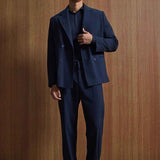 Navy double-breasted suit jacket with matching trousers, oversized fit
