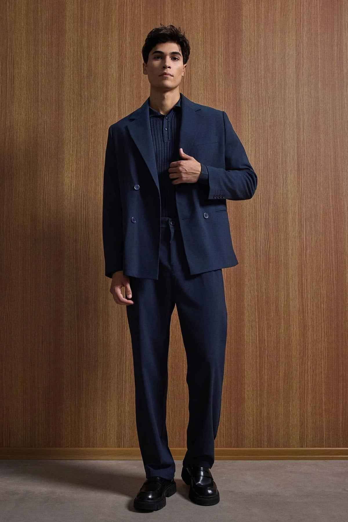 Navy double-breasted suit jacket with matching trousers, oversized fit