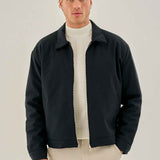 Men's dark blue zip-front jacket with stand collar and ribbed cuffs