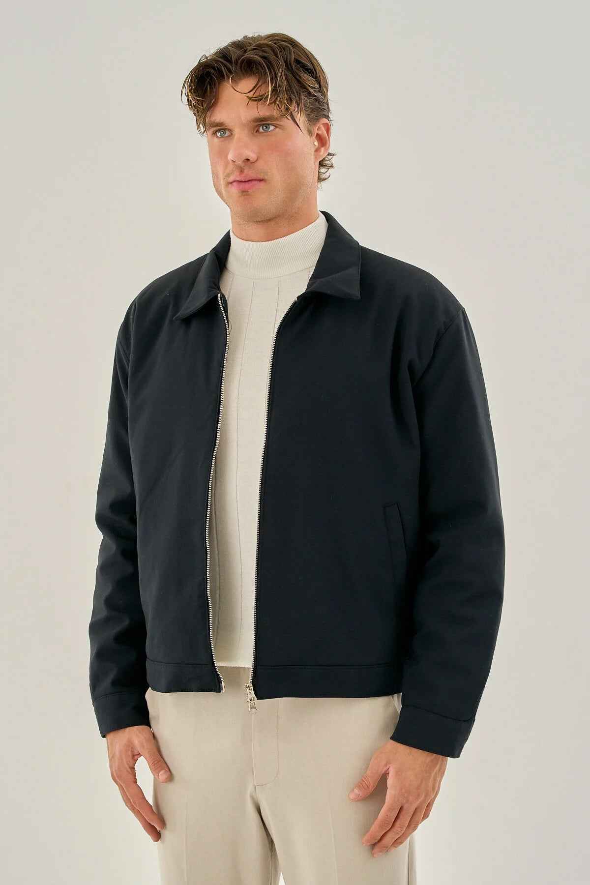Men's dark blue zip-front jacket with stand collar and front zip