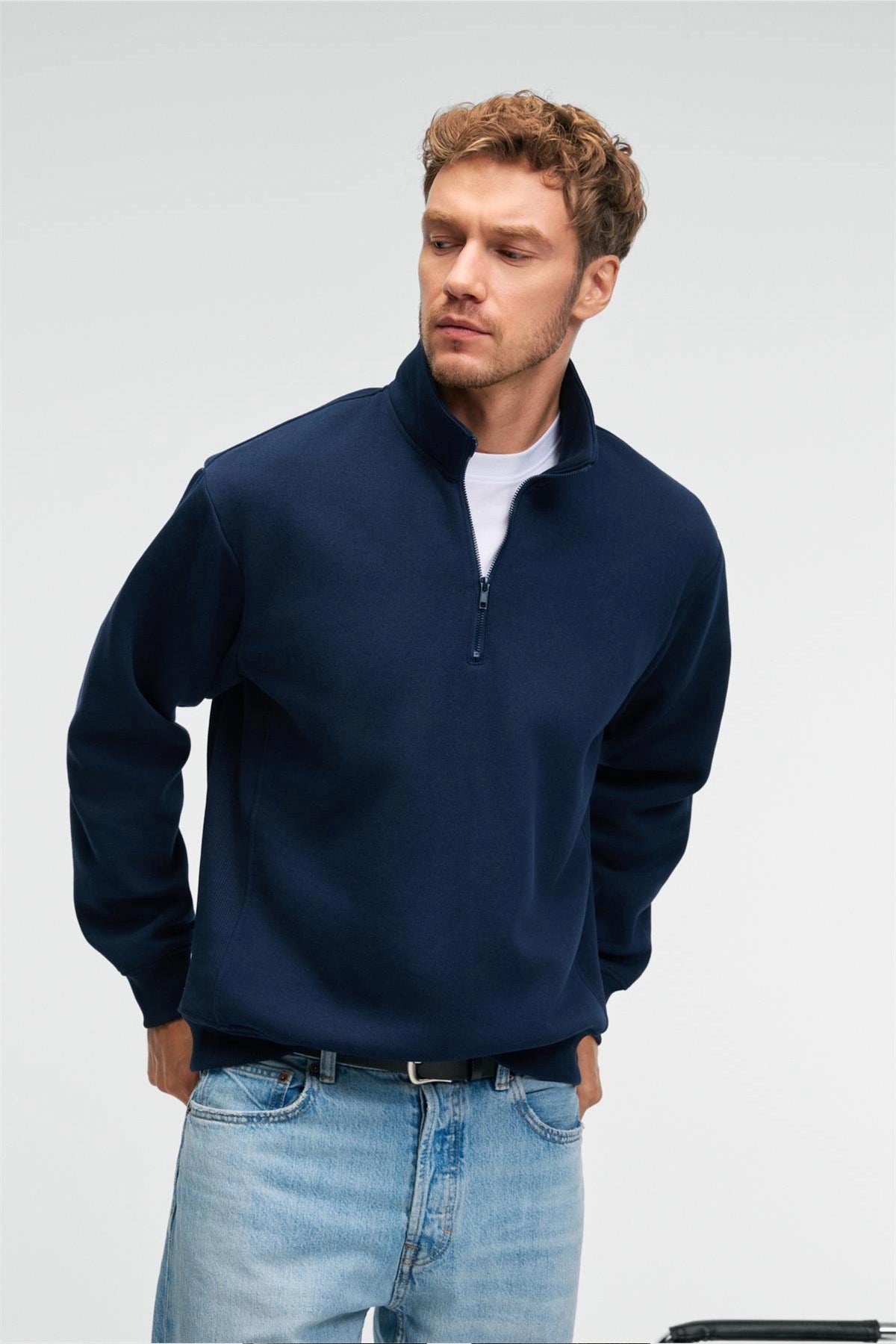 Navy blue relaxed-fit zip stand-collar sweatshirt with long sleeves and ribbed hem