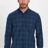 Men's navy plaid button-up shirt with front buttons and long sleeves