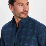 Men's navy plaid button-up shirt with spread collar and long sleeves