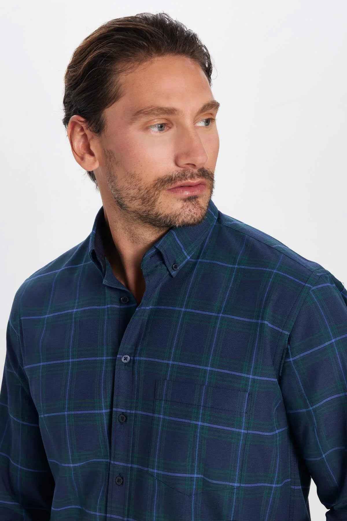 Men's navy plaid button-up shirt with spread collar and long sleeves