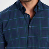 Men's navy plaid button-up shirt close-up of collar and button placket