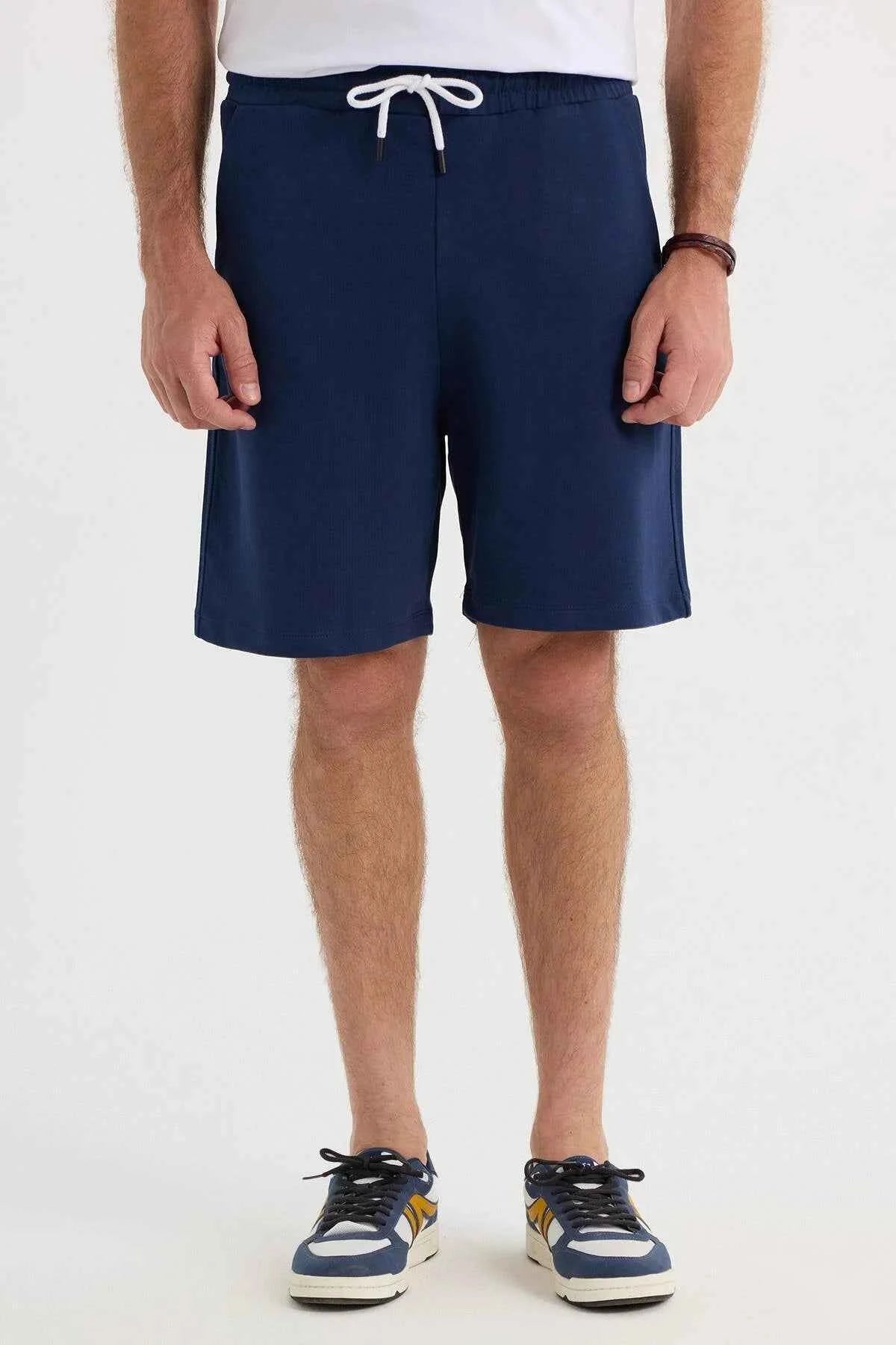 Men's navy blue knee-length shorts with drawstring waist and side pockets
