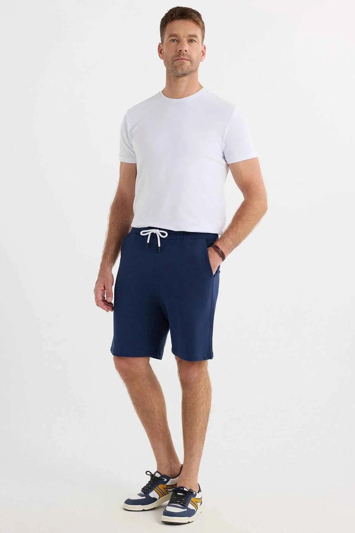 Men's navy blue drawstring shorts, knee-length with side seam pockets