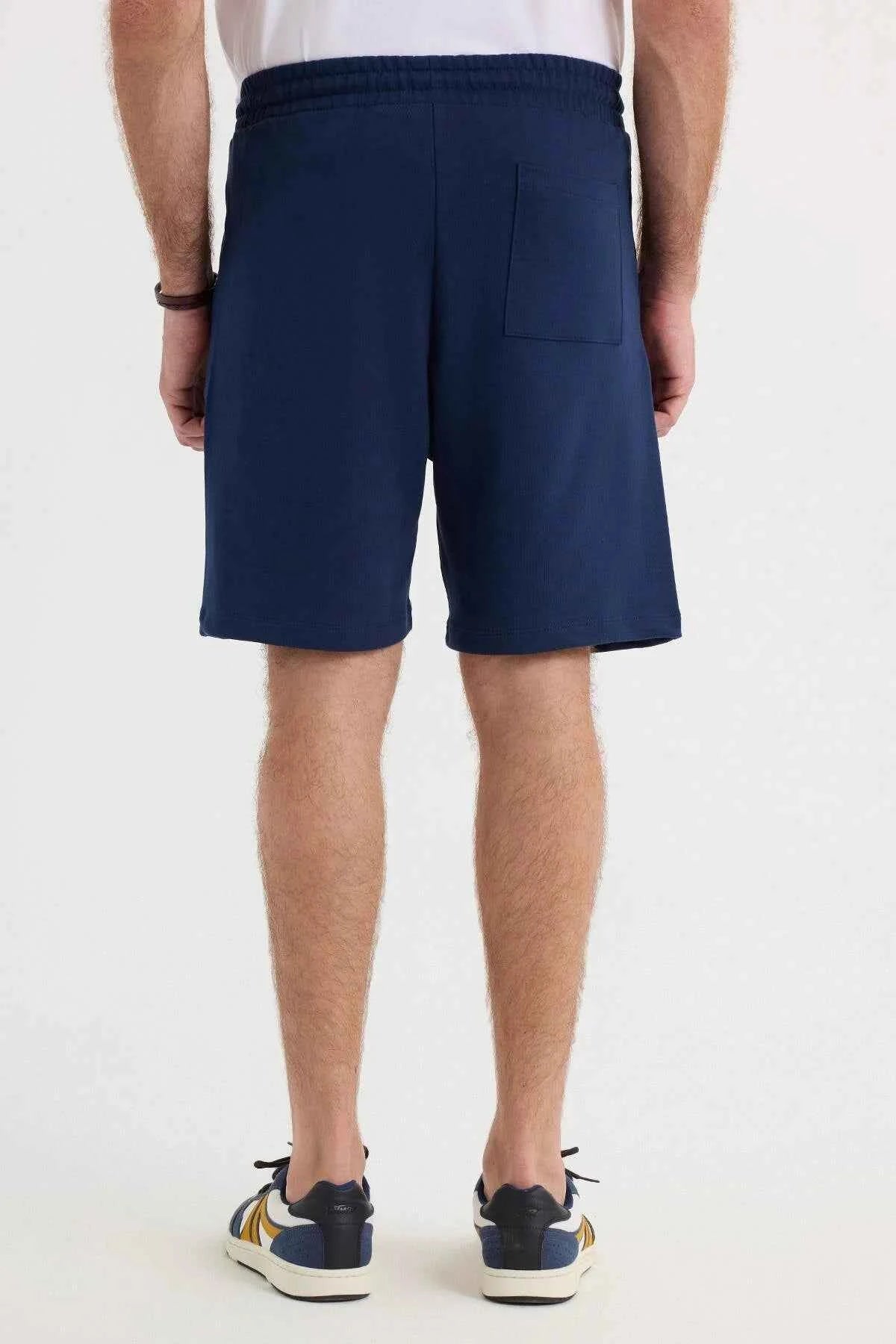 Men's navy blue shorts rear view with back patch pocket