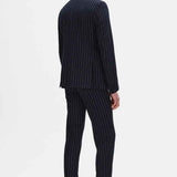 Men's navy pinstripe suit jacket and trousers, side view