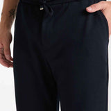 Men's Kaphone dark navy sweatpants with drawstring and elastic waist, front pleated detail