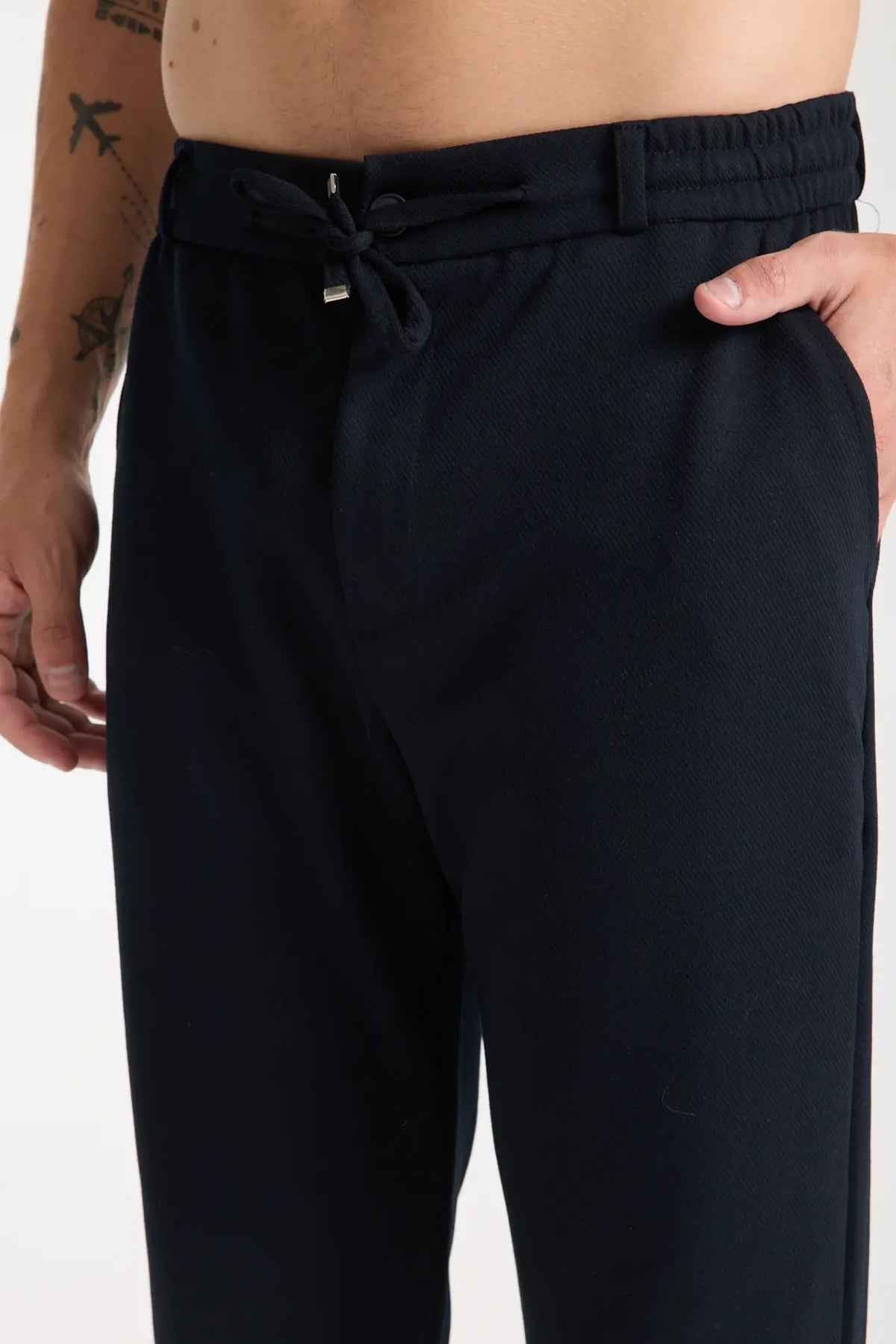 Men's Kaphone dark navy sweatpants with drawstring and elastic waist, front pleated detail