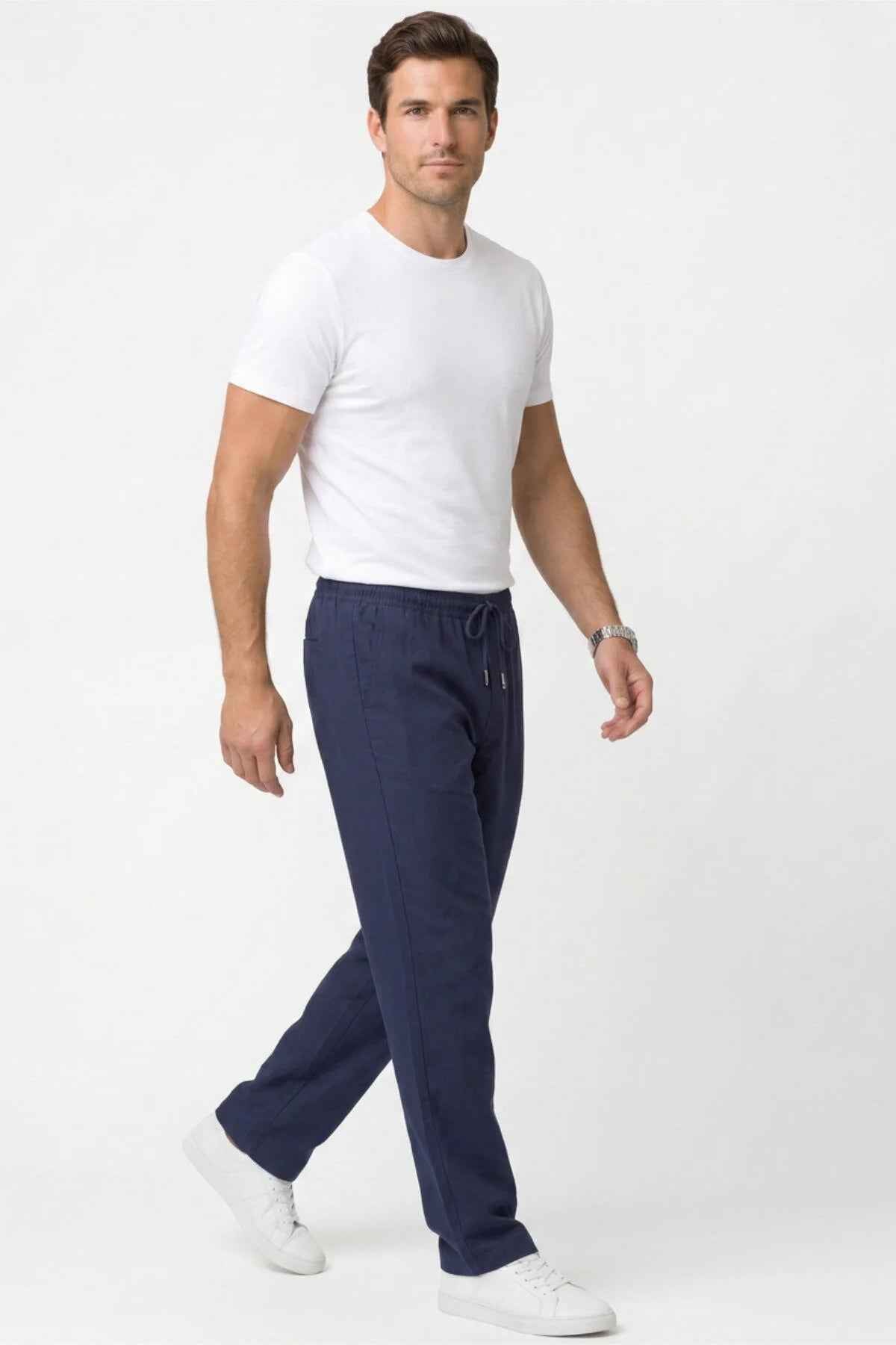 Men's Veleno navy track pants with drawstring waist, side pockets, and tapered legs