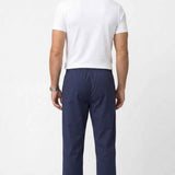 Men's Veleno navy track pants back view with elastic waistband and drawstring