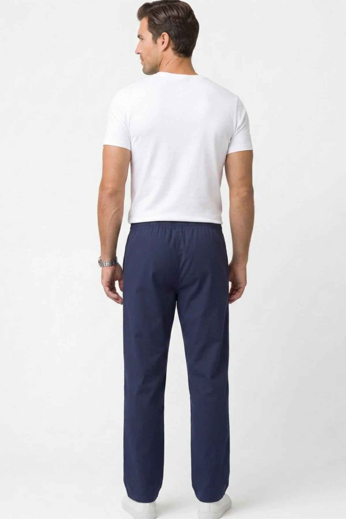 Men's Veleno navy track pants back view with elastic waistband and drawstring