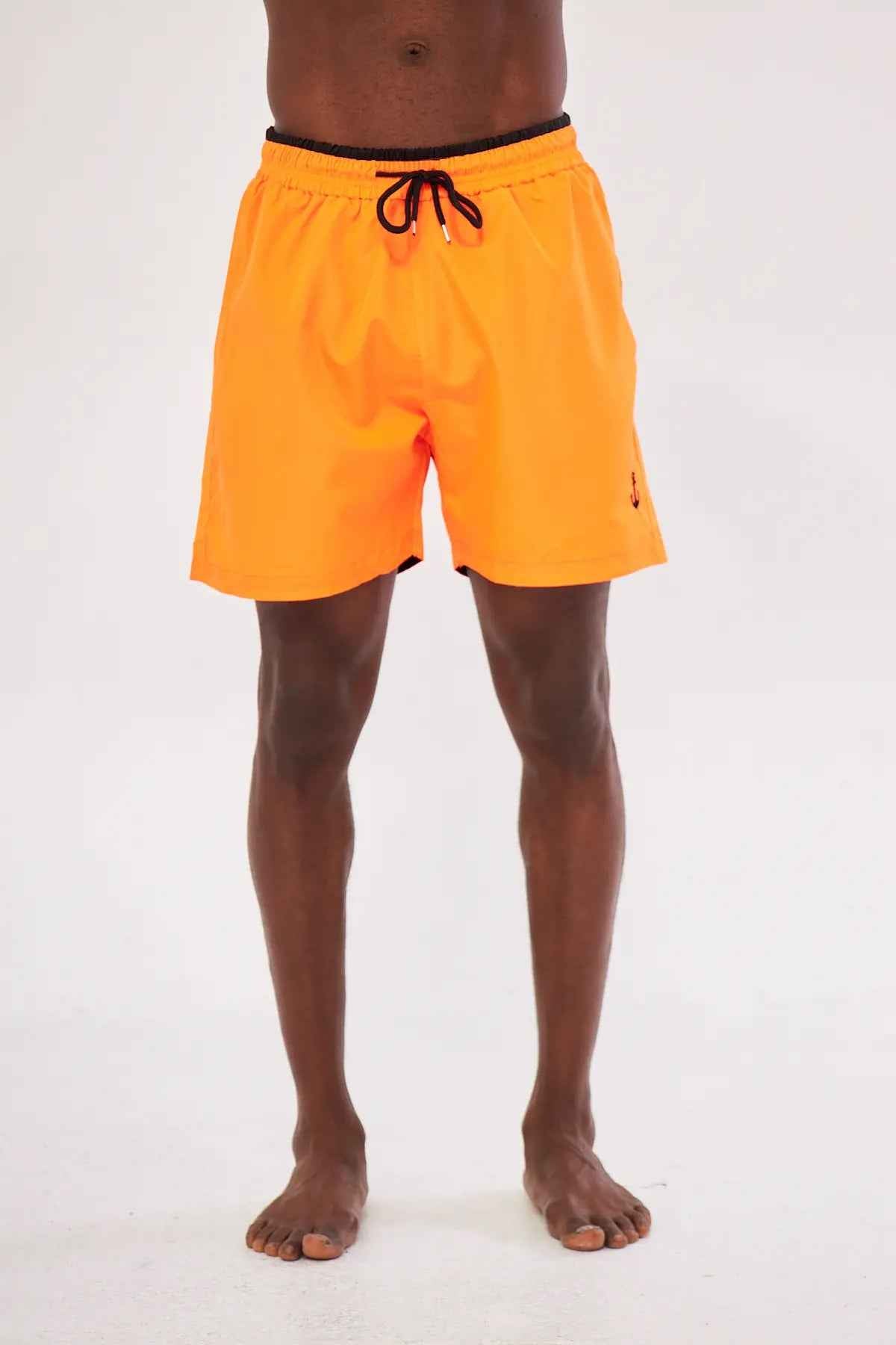 Men's orange swim shorts with black drawstring, back view