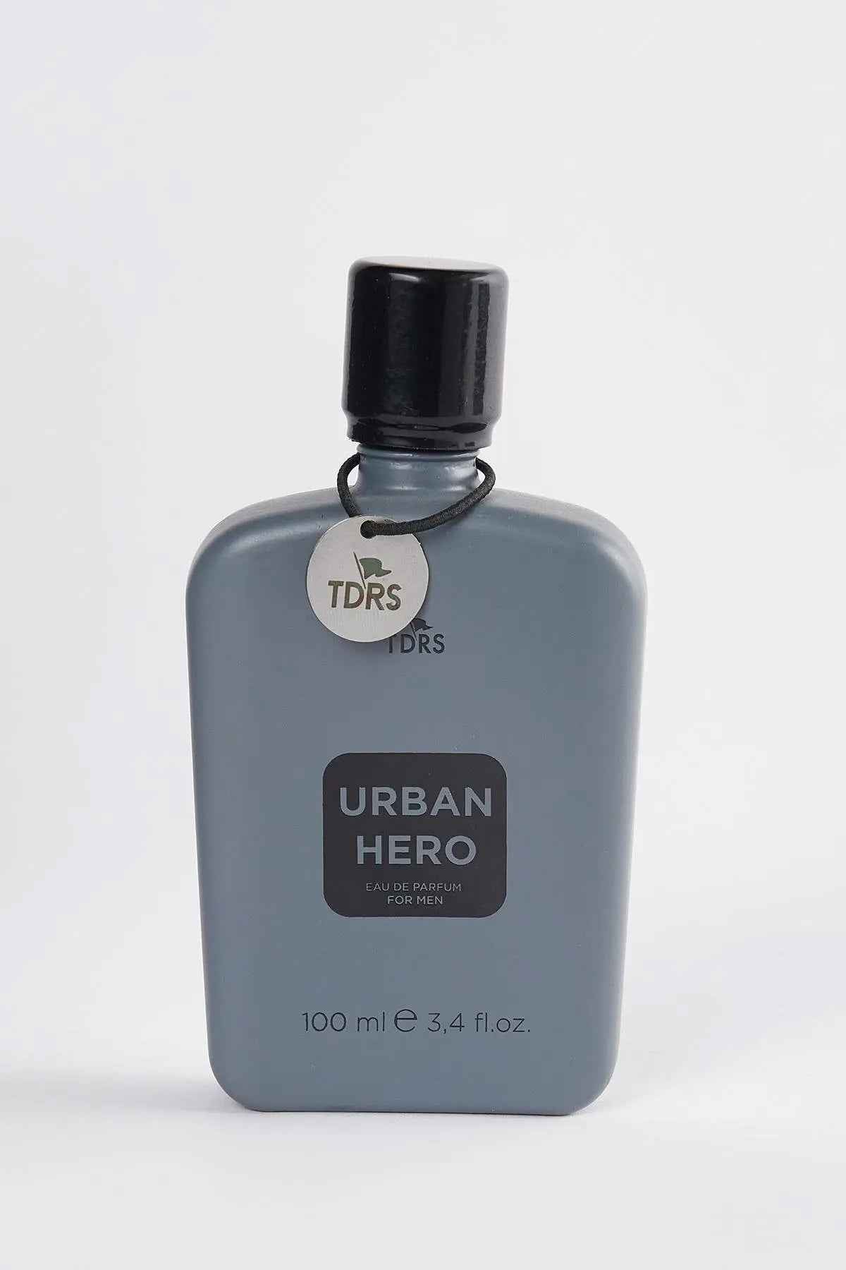 Men's eau de parfum bottle with dark cap, Urban Hero label, 100 ml