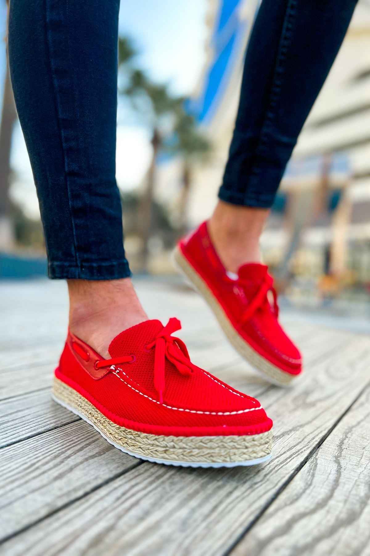 Men's red canvas espadrilles with lace-up bow and textured jute platform