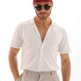 Men's red flat cap, front view with stitched crown