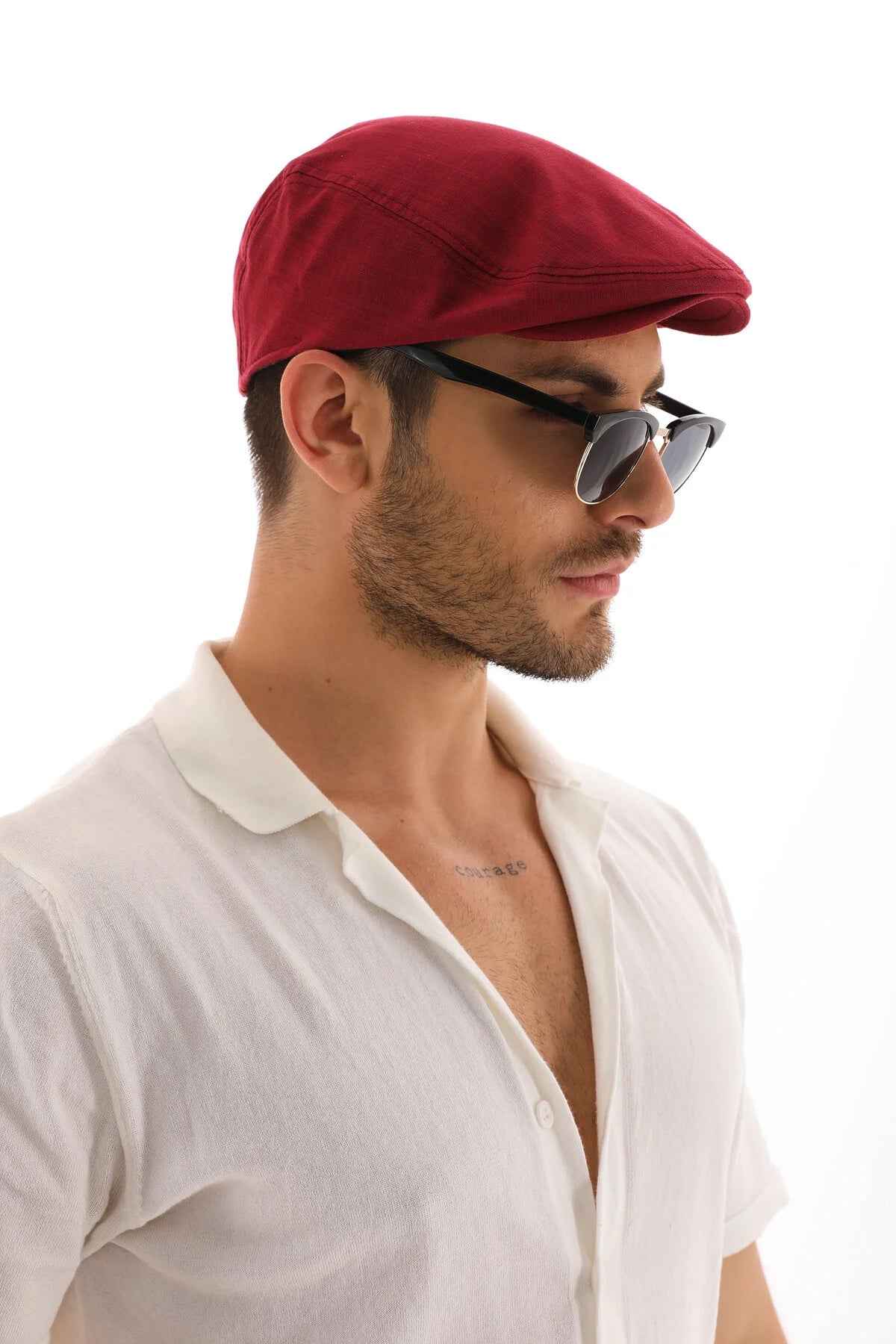 Men's red flat cap with curved brim and side profile
