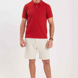 Red polo shirt with pointed collar and short sleeves