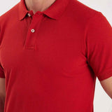 Red polo shirt close-up: pointed collar and top button