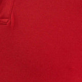 Red polo shirt fabric with button and placket detail