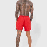 Red swimming shorts, back view, elastic waistband and drawstring ties