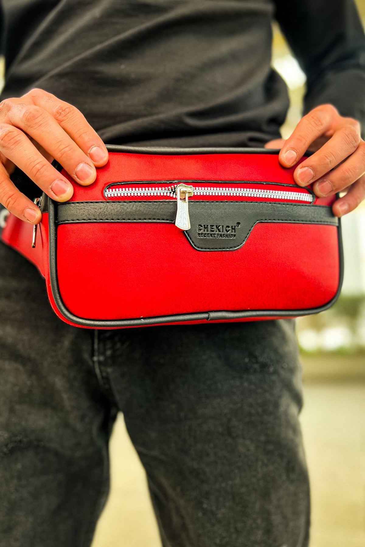 Red tablet bag with gray top flap and zipper brand patch