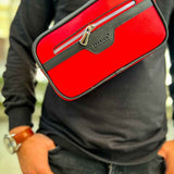 Red tablet bag with black edge trim and front zipper pocket