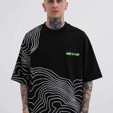 Men's oversize black T-shirt with white contour stripes and green Macstrar chest logo