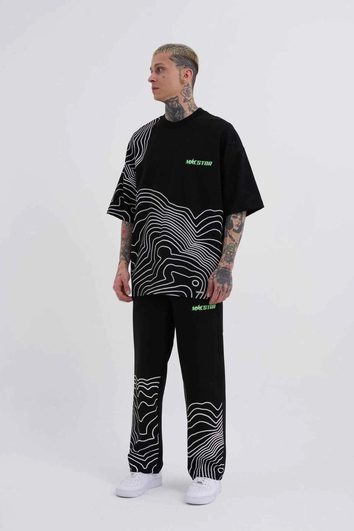 Men's oversize black T-shirt with white stripe panel graphic and green Macstrar logos